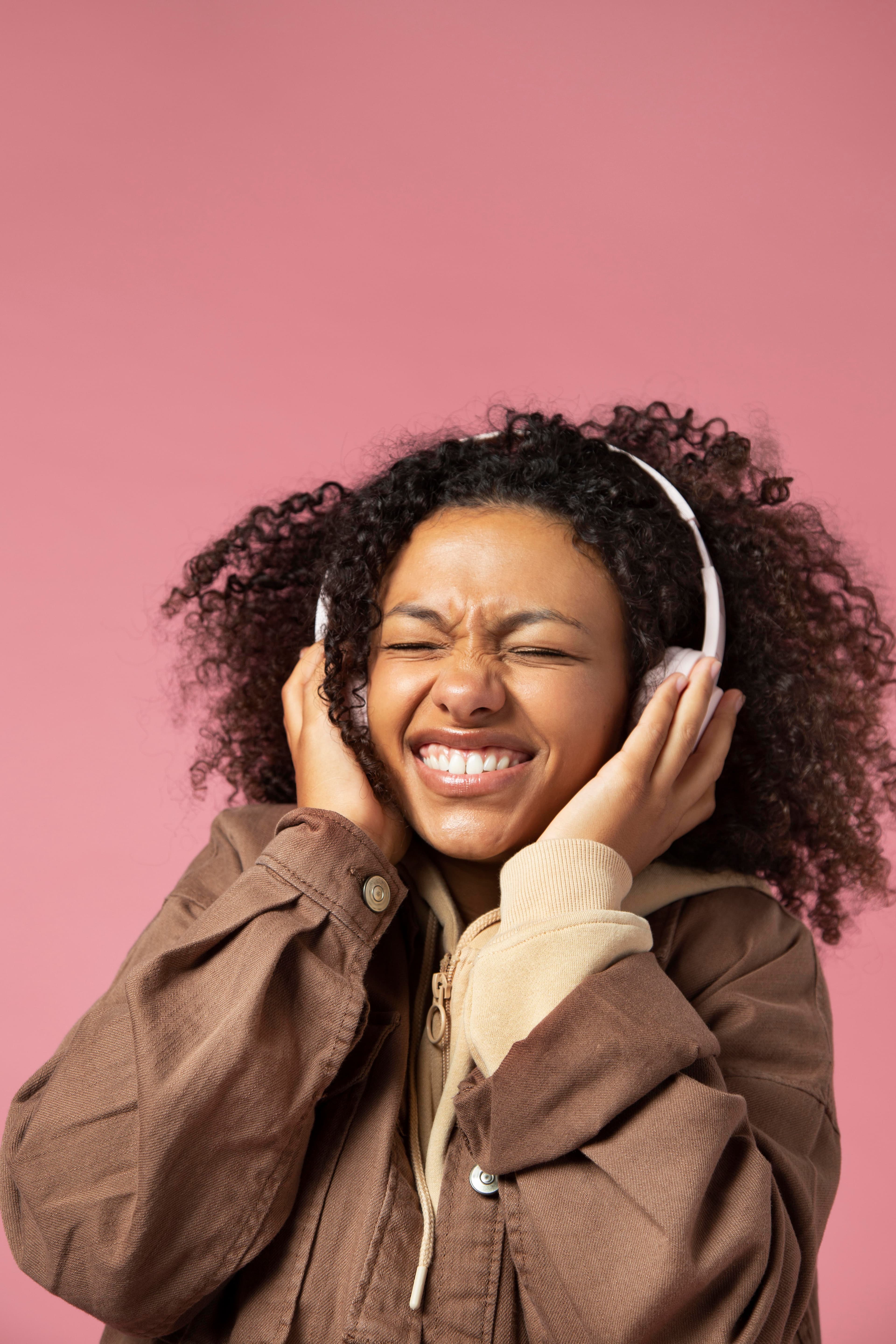 Young woman enjoying music with headphones